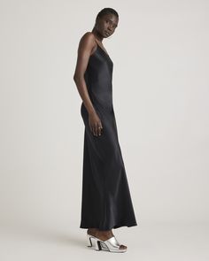 Skip the decisions and put on our 100% Washable Silk Maxi Slip Dress. Easy on the go, it makes the perfect base layer for any outfit. Crafted from best-in-class mulberry silk, this luxe layer has the same timeless silhouette as our beloved 100% Washable Silk Slip Dress, just in a longer maxi length. Buttery-soft, lightweight, and breathable, it’s great to wear all day (or night) long.  | Quince | Women's Maxi Slip Dress in Black, Size Large, Mulberry Silk Elegant Black Slip Dress For Work, Sleek Fitted Slip Dress For Daywear, Black Silk Dress For Work, Sleek Fitted Black Silk Dress, Luxurious Dress, Luxurious Dresses, Silk Maxi, Maxi Slip Dress, Silk Slip Dress