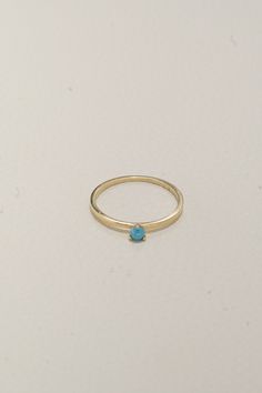 Discover elegance with our 14K Solid Gold Natural Blue Stone Ring. A blend of luxury and simplicity, this piece is your everyday companion to tranquility and style. Ideal for tastemakers. Shop now to elevate your daily wear. Blue Turquoise Ring For Promise, Fine Jewelry Style, Modern Blue Sapphire Ring In 14k Gold, Stackable Blue Turquoise Ring In 14k Gold, Minimalist Yellow Gold Topaz Birthstone Ring, Elegant 14k Gold Turquoise Birthstone Ring, Yellow Gold Topaz Birthstone Ring In Minimalist Style, Blue Solitaire Birthstone Ring In 14k Gold, Elegant 14k Yellow Gold Turquoise Ring, Formal 14k Gold Turquoise Blue Ring