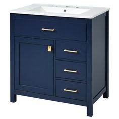 a bathroom vanity with a white sink and blue cabinet doors on the front, gold handles