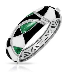 Interlacing lines of sparkling pave-set stones and sterling silver dance harmoniously in Tango, creating abstract shapes, colors, and patterns. Dynamic and rich inlaid stones glimmer passionately through the eyelets of hand-painted Italian enamel. Embrace the movement and romance of Tango. Emerald: Hand-painted black and white Italian enamel with white pave-set stones set into rhodium-plated, nickel allergy-free, 925 sterling silver. Champagne: Hand-painted Italian enamel with white pave-set sto Nickel Allergy, Jewelry Diamonds, Jewelry Words, Enamel Ring, Sterling Silver Bangles, Black And White Design, Enamel Jewelry, Silver Bangles, Abstract Shapes