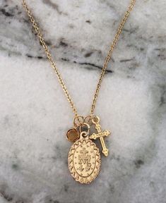 Cross and Swarowski Birthstone with Oxidized Silver Miraculous Mary Medal.  Gold Plated Stainless Steel  18'' Chain with Lobster Claw Clasp. Mary Necklace Gold, Miraculous Medal Necklace, Mary Necklace, Sea Turtle Necklace, Great Graduation Gifts, Catholic Medals, Turtle Necklace, Custom Charms, Charm Necklaces