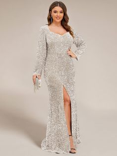 Sparkling sequins cover this show-stopping front slit evening dress. Fitted long sleeves and a plunging sweetheart neckline with darts on the front complement a stunning bodycon floor-length silhouette, making this glamorous evening dress a show-stopping style worthy of your next formal event or special occasion. Fit: Please refer to size chart. Length: Floor length. Sleeve Style: Long sleeves. Closure: It is concealed a zipper up the back. Undergarments: It is not padded, with lining. Fabric:The garment comprises sequin. Stretch: Fabric is high stretch. Occasion:Red Carpet Dress, Mother of the Bride Dress, Premiere Dress, Vintage Sequin Dress, Wedding, Banquet. Curvy Formal Dress, Plus Size Evening Gown Special Occasions, Sondra Celli, Asymetrical Dress, Dancesport Dresses, Western Gown, Plus Size Evening Gown, Glamorous Evening Dresses, Bodycon Evening Dress