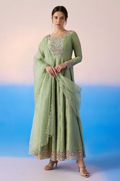 Sage green padded anarkali with thread embroidered floral blossom patterns, embellished by sequins and crystals. Comes with dupatta. - Aza Fashions Green Embroidered Floor-length Anarkali Set, Embroidered Green Floor-length Anarkali Set, Fitted Green Dola Silk Anarkali Set, Designer Green Embroidered Anarkali Set, Designer Embroidered Green Anarkali Set, Green Dola Silk Salwar Kameez For Reception, Green Anarkali Set With Zari Work For Reception, Green Embroidered Anarkali Set For Wedding, Reception Green Dola Silk Salwar Kameez