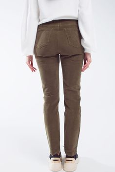 Step into comfort and style with our Skinny Cord Pants in the rich hue of olive green. Crafted for the ultimate wearability, these super-comfortable stretch corduroy pants are a staple for the autumn and winter months.  The skinny fit, accentuated by the full length design, complements your silhouette with a touch of urban flair. A five-pocket construction provides both functionality and fashion, while the button and zipper closure add a classic touch to the contemporary design.  Constructed from a blend of 98% Cotton and 2% Elastane, these pants offer the perfect balance of comfort and flexibility. The corduroy texture adds a touch of sophistication to the basic and urban appeal of this wardrobe essential.  Our model, wearing size S, embodies the versatility of these pants. With measureme Green Relaxed Fit Bottoms For Fall, Relaxed Fit Green Bottoms For Fall, Olive Wide Leg Pants For Fall, Full Length Green Pants For Fall, Green Corduroy Full-length Bottoms, Green Full-length Corduroy Bottoms, Green Full-length Corduroy Pants, Green Full Length Corduroy Pants, Green Full-length Bottoms For Fall