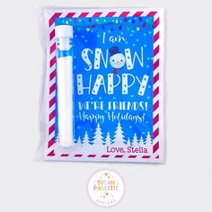 a snow happy new year's greeting card with a pen and envelope in it