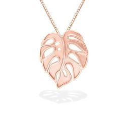 14K Yellow Gold Monstera Pendant. 17" 14K Yellow Gold Chain included. The pendant measures approximately 11/16" in length. 14k Rose Gold Diamond Necklace With Adjustable Chain, Rose Gold Plated Jewelry With Large Pendant, Custom Rose Gold 14k Pendant Necklace, Custom Rose Gold 14k Gold Pendant Necklace, 14k White Gold Jewelry With Large Pendant, Rose Gold Sterling Silver Jewelry With Large Pendant, Rose Gold Tarnish Resistant Pendant Necklace, Rose Gold Tarnish-resistant Pendant Necklace, Rose Gold 14k Gold Chain Necklace