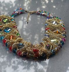 "Collar necklace. Twisted gold metal alloy, with multicoloured crystal, chain necklace. Measures Chain length 39  cm (15.5\") extra 7 cm (2.5\") necklace width  5cm (2\") You receive your gift in an organza bag Thank you" Party Gold Plated Beaded Chain Necklace, Multicolor Jeweled Beaded Necklace For Party, Gift Crystal Chain Necklace In Metal, Gold Crystal Rhinestone Necklace With Chain, Multicolor Jeweled Rhinestone Necklace Gift, Multicolor Jeweled Rhinestone Necklace For Gift, Multicolor Crystal Beaded Necklaces For Party, Multicolor Crystal Necklaces For Parties, Colorful Beads Metal Jewelry For Party