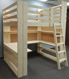 a bunk bed made out of plywood is in an office