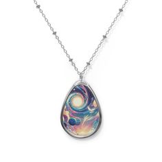 Add a custom touch to what you wear or sell unique pieces to DIY enthusiasts with this personalized galaxy swirl necklace. Zinc alloy pendant and durable chain ensure long-lasting brilliance Cosmic swirl design on a white aluminum print panel, perfect for space lovers Unique ellipse-shaped pendant that adds a celestial touch to any outfit Ideal for personalizing or gifting to astronomy enthusiasts and DIY jewelry fans Robust and eye-catching, a stunning accessory for those who love the stars Add Handmade Silver Cosmic Jewelry, Space-themed Pendant Necklace As Gift, Spiral Multicolor Necklace Gift, Multicolor Spiral Necklace Gift, Celestial Multicolor Jewelry For Gift, Celestial Style Multicolor Jewelry For Gifts, Space-themed Silver Round Pendant Necklace, Artsy Silver Round Pendant Jewelry, Artsy Silver Necklace With Round Pendant