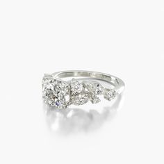 a diamond ring with three stones on it