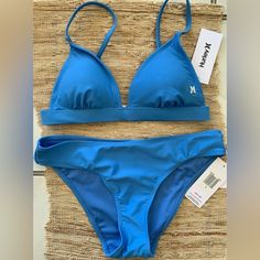 Hurley Womens Blue Fixed Triangle Bikini Top -Sz Small *Listing Is For Top Only* Brand: Hurley Composition: 84% Polyester 16% Spandex Care Instructions: Drip Dry, Line Dry, Shade, Machine Wash, Cold Or Hand Wash Elasticity: Stretch Fabric Swim Top Straps: Adjustable Straps Swim Top Style: Bralette Top Swim Cup Feature: Removable Padding Fastener Type: Hook And Loop Fastener Surf Bikinis, Swim Brands, Bralette Top, Bralette Tops, Cheeky Bikinis, Swim Top, Hook And Loop, Shoulder Straps, Spandex