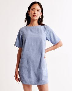 Elevate your casual wardrobe with the Abercrombie & Fitch Women's Linen-Blend T-Shirt Dress in a refreshing light blue. Perfect for effortless styling, this piece combines comfort and elegance.

- Size: XS
- Color: Light Blue
- Material: Body - Linen, Cotton; Lining - Cotton
- Gender: Female
- Features: Crew neckline, back keyhole closure

This dress is crafted from a soft linen-cotton blend, ensuring breathability and comfort all day long. The easy-fitting silhouette with a classic crew necklin Summer Soft-washed Washed Blue T-shirt, Casual Blue Cotton T-shirt Dress, Blue Linen Button-up Dresses, Blue Short Sleeve Cotton T-shirt Dress, Female Features, Dress Light Blue, Medium Wash Cotton Button-up Shirt Dress, Short Sleeve Dress Shirt, Dress Shirts For Women