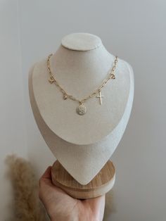 Looking for a fun and trendy accessory? Look no further than our charm necklace! This versatile piece is perfect for everyday wear, adding a touch of charm to any outfit. ∙ D E T A I L S ∙ - 18k Gold Filled - 16" + 3" extender - All charms included ∙ G O L D ∙ F I L L E D ∙ Gold-filled components contain 100+ times more real gold than gold-plated components and are both durable and tarnish resistant. It is more affordable and accessible than solid gold but higher quality than gold plated. Everyday Necklace With Initial Pendant And Removable Charms, Everyday Initial Pendant Necklace With Removable Charms, Everyday Pendant Necklaces With Removable Charms, Adjustable Necklace With Removable Charms For Everyday, Everyday Necklaces With Removable Pendant Charms, Dangling Charms Round Pendant Necklace, Everyday Necklace With Dangling Charms And Round Pendant, Everyday Trendy Dangle Charm Necklaces, Trendy Everyday Charm Necklaces With Dangling Charms