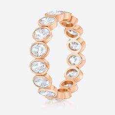 A modern update to the classic eternity band. Platinum or 14k solid gold Diamonds: G/H color SI clarity 1.62 carats, 18 diamonds (~.08 pt each) Carat total weights based on finger size 6 4.2 mm width We recommend ordering 1/4 of a size up from your true finger size to avoid a snug fit, as eternity bands cannot be resized This item is Final Sale and excluded from all promotional discounts. Timeless Rose Gold Round Cut Eternity Band, Diamond White Eternity Band With Rose Cut Diamonds, Luxury Rose Gold Diamond Eternity Band, Luxury Rose Gold Diamond Ring With Bezel Setting, Classic Rose Gold Cubic Zirconia Eternity Band, Rose Gold Eternity Band With Brilliant Cut Cubic Zirconia, Rose Gold Diamond Ring With Bezel Setting, Rose Gold Round Diamond Ring With Bezel Setting, Round Rose Gold Eternity Band With Diamond Accents