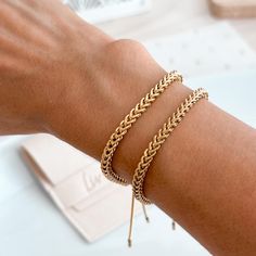 * A B O U T * O U R * B R A C E L E T* 18K Gold Adjustable Bracelet Elevate your style with this adjustable 18K bracelet. It features an adjustable slider for a custom fit and is perfect for layering or wearing individually.  * D E T A I L S * * 18K Gold Plated * Tarnish Free * Adjustable ∙ ∙ ∙ ∙ ∙ ∙ ∙ ∙ ∙ ∙ ∙ ∙ ∙ ∙ ∙ ∙ ∙ ∙ ∙ ∙ ∙ ∙ ∙ ∙ ∙ ∙ ∙ ∙ ∙ * E T S Y * S H O P MORE SOLID GOLD EARRINGS: https://www.etsy.com/shop/livaurajewelry?ref=seller-platform-mcnav ∙ ∙ ∙ ∙ ∙ ∙ ∙ ∙ ∙ ∙ ∙ ∙ ∙ ∙ ∙ ∙ ∙ ∙ ∙ ∙ Gold Friendship Bracelets With Adjustable Length, Adjustable Gold-tone Charm Bracelet With Jubilee Details, Gold Adjustable Box Chain Bracelet, Adjustable Gold-tone Jubilee Charm Bracelet, Gold Metal Braided Bracelet, Gold Metal Bracelets For Friendship, Elegant Gold Bangle Friendship Bracelets, Gold Jubilee Bracelet For Friendship, Vintage Gold Bracelets With Adjustable Chain