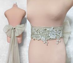 - Handmade with meticulous attention to detail - Materials: soft tulle embroidered with gold thread (Lurex) - Extra-long length of 450cm allows for versatile styling options - Central part of the belt is adjustable in width (8-20cm) - Unique train tails with a width of 50cm - Gift wrapping available With its extra-long length of 450cm, the belt allows for versatile styling options. It can be tied or knotted around your waist, creating a beautiful bow detail that can be worn to the front or the back. For a more minimalistic effect, you can simply tie it in a knot. The central part of the belt is adjustable in width, ranging from 8 to 20cm, allowing you to customize it to your liking. The gold tulle bridal belt also features unique train tails with a width of 50cm, adding an exquisite touch Fitted Lace Bridal Belt For Ceremony, Lace Bridal Belt For Ceremony, Elegant Wedding Sashes With Decorative Bow, Fitted Bridal Belt With Ribbon For Wedding, Elegant Lace Bridal Belt For Party, Lace Bridal Belt With Sashes For Wedding, Elegant Fitted Lace Bridal Belt, Elegant Lace Fitted Bridal Belt, Bridal Belts And Sashes