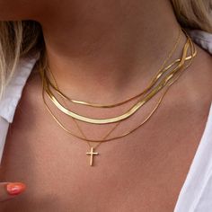 Find solace in the Stillness Necklace, a dainty double-layer piece that captures the smooth and light essence of air. Its design is a whisper of calm in a chaotic world, a reminder to embrace serenity in every moment. Gold Cross Necklace Layered, The Cross Necklace, Cross Necklace Layering, Physical Aesthetic, Angel Number Necklace, Cross Necklace Women, Meaningful Design, Necklace Stack, Cross Necklaces