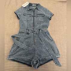 Denim Zip Up Romper With Tie At Waist, Has Stretch, Nwt, Size Medium Casual High Rise Denim Jumpsuits And Rompers, Casual High-rise Denim Jumpsuit, High Waist Light Wash Denim Jumpsuits And Rompers, High Waist Washed Blue Denim Jumpsuit, Fitted Denim Jumpsuits And Rompers For Casual Wear, Fitted Washed Blue Denim Jumpsuit, Trendy Fitted Washed Blue Denim Jumpsuit, Casual Fitted Washed Blue Denim Jumpsuit, Fitted Denim Casual Overalls