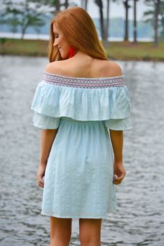 You'll be a vision in this baby blue dress! Layered off shoulder sleeves and red embroidery in the smocked top make this dress stand out. An elastic waist gives is plenty of stretch. Fabric is a lightweight 100% cotton-blend and is lined.  memorial day. fourth of july. red, white and blue. Spring Off Shoulder Dress With Smocked Bodice, Spring Off-shoulder Dress With Smocked Bodice, Summer Peasant Dress With Smocked Back, Embroidered Smocked Dress For Spring, Summer Cotton Smocked Dress With Elastic Neckline, Spring Off-shoulder Smocked Dress With Smocked Bodice, Summer Off-shoulder Dress With Smocked Bodice, Off-shoulder Summer Dress With Smocked Bodice, Spring Off-shoulder Dress With Elastic Neckline