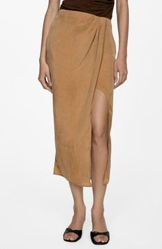 Beautifully textured fabric with a subtle sheen draws the eye in to this faux-wrap skirt that's perfected by a leg-baring side slit. Pull-on style Side slit 100% lyocell Machine wash, line dry Imported Mango Desert, Festival Essentials, Faux Wrap Skirt, Linen Loungewear, Skirt Medium, China Dress, How To Iron Clothes, Dress Shapes, Cashmere Coat