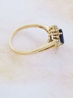 Buy 14k Yellow Gold Sapphire and Diamond Ring Online in India - Etsy Timeless 14k Stamped Oval Sapphire Ring, Timeless Oval Sapphire Ring Stamped 14k, 14k Gold Halo Ring With Prong Setting, Fine Jewelry Yellow Gold Sapphire Ring With Halo Setting, 14k Gold Emerald Cut Sapphire Ring With Halo Setting, 14k Gold Emerald Cut Halo Setting Ring, Yellow Gold Sapphire Ring With Halo Setting, Formal Gold Rings With Accent Stones, Cluster Sapphire Ring With Prong Setting For Promise