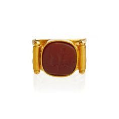 Classical elegance always attracts my eye.  This beautifully detailed and crafted signet is a refined example of jewelry crafted in England during the Victorian period that referenced architectural and ancient findings of the century before from ruins found at Pompeii and Herculaneum.  This hand crafted 18KT Gold ring with an engraved tablet of carnelian sports a warrior on horseback. A quintessential style of this period.  3 bands of warmly hued gold showcase a central cushion shaped tablet and 2 torpedo shaped shoulders on each side.  Elegant and strong.  A true statement signet.   Not marked but tested 18KT. 7.9 grams.  Size 5.5  but can be resized within reason. Classic Carnelian Signet Ring For Formal Events, Classic Carnelian Signet Ring For Formal Occasions, Vintage Carnelian Jewelry With Polished Finish, Vintage Polished Carnelian Jewelry, Elegant Gold Signet Ring With Carnelian, Antique Carved Signet Ring For Formal Occasions, Vintage Carnelian Engraved Jewelry, Antique Intaglio Ceremonial Jewelry, Antique Intaglio Jewelry For Ceremonial Occasions