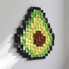 a piece of paper that has been made into a wall decoration with an eye on it