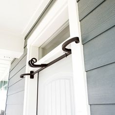 a close up of a door handle on a house