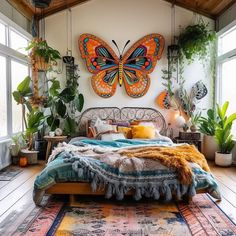 a bedroom with lots of plants on the wall and a bed in front of it