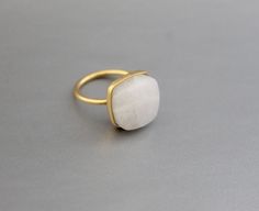 ♦♦ Beautiful handcrafted ring ◘Stone Information: Genuine White Agate - Cut: Cushion Size: 13 mm ◘ Metal: 925 Sterling Silver ◘ Band: 1.5 mm ◘ Setting: Open back bezel setting ◘ Finish: High polish (shiny) ◘ Nickel free ◘ Anti tarnish ◘ Vermeil Gold ◘ Handmade band: 14 gauge solid sterling wire This ring is adorably rustic, easy to wear, & stackable! ◘Please Note - The Ring in the Picture can be available or Sold out. Every Ring is Made of a Unique Gemstone. Therefore, Colors and Inclusions Minimalist Moonstone Ring With Natural Stones For Wedding, Minimalist Moonstone Ring For Wedding, Minimalist Moonstone Ring With Natural Stones As Gift, Minimalist Natural Stone Moonstone Ring As A Gift, Minimalist Moonstone Ring With Natural Stones, Minimalist Natural Moonstone Ring As Gift, Minimalist Natural Stone Rings As Gifts, Minimalist Natural Stone Rings Gift, Minimalist Crystal Ring With Natural Stones As Gift