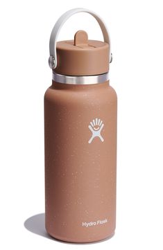 a tan hydro flask bottle with a white handle