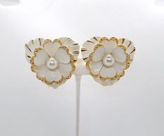 ALEXANDRE FIFTH AVE Clip On Earrings White Flower-shaped Clip-on Earrings For Formal Events, White Flower-shaped Clip-on Earrings For Formal Occasions, White Flower Shaped Clip-on Earrings For Formal Events, Formal White Clip-on Flower Earrings, White Flower Clip-on Earrings For Formal Events, Vintage Gold Flower Clip-on Earrings, Retro White Clip-on Earrings As Gift, White Retro Clip-on Earrings As Gift, Vintage Flower Earrings For Formal Occasions