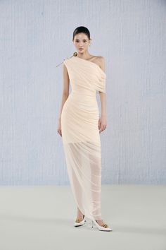 This dress features a unique asymmetric design and gathered details, crafted from luxurious viscose fabric. Perfect for any formal event, this dress will make you feel confident and stylish. Sarong Style, Mean Blvd, Rose Brooch, Asymmetric Dress, Nude Dress, Floor Length Dress, Model Outfits, Asymmetrical Design, Floor Length Dresses