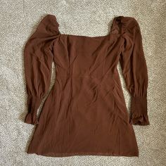 Brown Dress With Long Sheer Sleeves From Aritzia In A Size 6! I Missed The Return Window So It Is New With Tags. Super Cute Style, The Color Just Didn’t Work For Me. Please Note That It Is Brown Not Pink The Color Of The Mode(I Couldn’t Find Photos Of The Brown Color On The Aritzia Website) Fitted Long Sleeve Lined Mini Dress, Fitted Long Sleeve Mini Dress With Lining, Solid Color Flowy Mini Dress For Date Night, Brown Fitted Square Neck Dress, Brown Stretch Mini Dress, Elegant Brown Dress With Smocked Back, Brown Long Sleeve Dress For Date Night, Fitted Brown Mini Dress With Square Neck, Brown Fitted Mini Dress With Square Neck