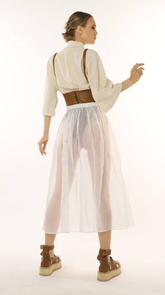 The Casual transparent organza skirt, with midi length elastic, is the perfect skirt for a casual outfit, for a photo shoot, or even an artistic event. It combines excellently with body/shirts. It's the perfect choice for creating an artistic look due to its feminine design.100% natural OrganzaOrganza is a durable fabric that is resistant to organic solvents and maintains its size and original shape.MaintenanceOrganza products can be washed in a washing machine on a gentle regime with a temperat Organza Skirt, Overlay Skirt, Premium Product, Feminine Design, Reference Photos, White Skirts, Pure White, Skirt Outfits, Casual Outfit