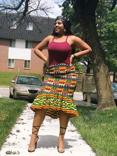 "Kente print is one of our favorite fabric from Africa.  We are happy to be offering such a timeless beautiful skirt. This skirt is handmade with love, paying attention to details to have you looking stylish in all your outing. Customisations are welcome, numerous fabric options are available  Product details: High quality print 100% African cotton wax Approximate length of skirt 32\" High low details Zipper Care instructions: Wash with mild soap, do not bleach" Midi Mermaid Skirt, African Midi Skirt, Skirt African Print, Diy Belt For Dresses, African Skirt, Kente Print, Hi Low Skirts, African Print Skirt, African Skirts