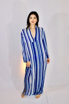 Low front, bell sleeve, maxi caftan. Deadstock semi-sheer blue & white rayon & cotton blend fabric. No lining. Blue Long Sleeve Maxi Dress For Vacation, Striped Long Sleeve Maxi Dress For Vacation, Casual Long Blue Kaftan, Long Blue Summer Kaftan, Blue Long Sleeve Maxi Dress For Beach, Bohemian Striped Long Sleeve Kaftan, Striped Long Sleeve Bohemian Kaftan, Spring Striped Kaftan For Beach Cover-up, Chic Blue Maxi Length Kaftan