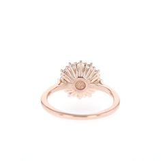 a rose cut diamond ring on a white background