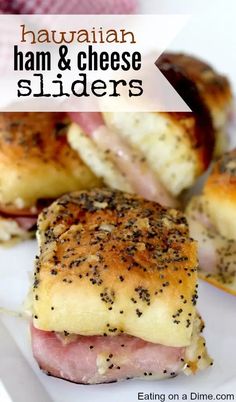 hawaiian ham and cheese sliders on a white plate with text overlay that reads, hawaiian ham and cheese sliders