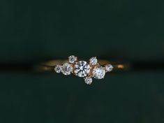 an engagement ring with three diamonds on it