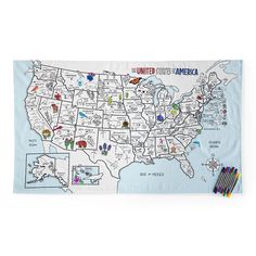 a map of the united states with colored pencils in front of it on a white background