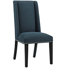 a blue upholstered dining chair with studded trimmings on the legs