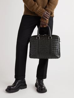 Bottega Veneta's briefcase has been handcrafted in Italy from dark-green leather using the label's intrecciato technique, the signature weave makes the hide much more durable. It has a neat slim profile and is fitted with a detachable shoulder strap so you can alternate between that and the top handles. Luxury Woven Leather Bag For Work, Designer Textured Leather Briefcase For Work, Designer Leather Briefcase For Business, Designer Textured Leather Briefcase For Business, Designer Leather Briefcase For Business Meetings, Designer Leather Briefcase For Office, High-end Leather Briefcase For Business, High-end Leather Business Briefcase, Leather Bag With Intrecciato Weave For Work