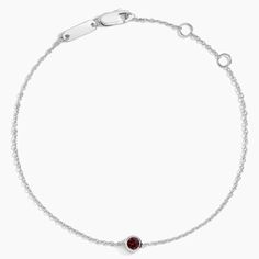 Garnet Bezel Bracelet - Silver. Both elegant and timeless, this bracelet features a charming bezel-set garnet on a delicate cable chain. The length of the chain can be adjusted to 6, 6.5, or 7 inches to suit individual preference. Bezel Bracelet, The Chain, Bracelet Silver, Bezel Setting, Cable Chain, Eternity Ring, Quality Jewelry, Silver Bracelets, Garnet