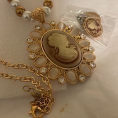 Beautiful Faux Gold-Tone And White Pearl 24” Necklace W/Matching 2.5” Cameo Pendant And Pierced Cameo Stud 2/2” Earrings Brand New Boxed. Vintage Cameo Jewelry, Qvc Jewelry, 2 Earrings, Cameo Jewelry, Vintage Cameo, Cameo Necklace, Gold Cream, Cameo Pendant, Cream And Gold