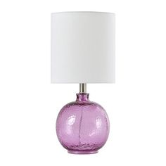 This glass table lamp brings a touch of antique beauty to any master suite. The translucent finish brings a fun, exciting quality to the fixture. The shade is constructed from white fabric and complements the glass body.Included: 1 Lamp Shade(s)Light Bulb Base: E26 Medium (standard)Light Bulb Type: IncandescentNumber of Light Bulbs: 1Power Source: Plug-InShape: EmpireSwitch Type: On/Off SwitchUl Location Rating: DryWattage (watts): 60wMeasurements: 9.5 Width/Inches, 9.5 Depth/Inches, 20 Height/InchesCord Length (ft.): 5 FtShade Height: 10 InWeight (lb.): 1.5 LbAssembly: Assembly RequiredBase Material: 100% GlassShade Material: LinenCare: Wipe CleanDecor Styles: TraditionalCertifications And Listings: Ul ListedMaterial: GlassCountry of Origin: Imported Purple Table Lamp, Lavender Room, Purple Table, Lamps Table, Bright Purple, Light Bulb Types, Purple Glass, Glass Table Lamp, Glass Table