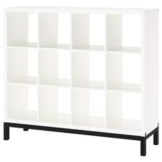 a white bookcase with six cubes on the bottom and four shelves below it