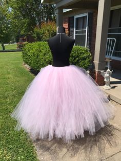 "This listing includes a Light Pink Bridal Tutu please select the length range that you would desire and make a note in the note to seller section of the length you would like to go with. The Light Pink Tutu pictured is a 41\" tutu. The second picture showing the silver tutu on the lady is a 34\" length tutu. Thank you for shopping with Princess Tutus Boutique. If you have any questions please feel free to convo us at anytime and we will get back with you just as soon as possible. We strive to h Pink Tiered Petticoat With Attached Cancan, Pink Tiered Skirt With Attached Cancan, Stretch Pink Tulle Petticoat, Fitted Pink Petticoat For Dance, Pink Fitted Petticoat For Dance, Pink Fitted Wedding Bottoms, Spring Pink Skirt For Dance, Pink Fitted Bottoms For Wedding, Pink Tiered Skirt For Wedding