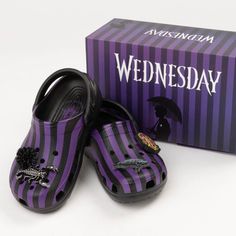 Unleash Your Inner Goth With The Wednesday X Crocs Classic Nevermore Academy Clog! These Limited Edition Crocs Feature Fully Molded Easy-To-Clean Croslite Foam Construction In The Iconic Clogs Silhouette, Wednesday-Themed Graphic, Nevermore Academy Jibbitz Charms, Heel Straps For A Secure Fit, And Lightweight Outsoles For Flexible Traction. Wednesday-Themed Graphics Styled After Her Signature Striped Uniform And Removable Jibbitz Charms For Added Style Vented Forefoot Offers Enhanced Breathabili Cool Crocs, Nevermore Academy, Black Crocs, The Wednesday, Limited Edition Shoes, Oxford Heels, Women's Crocs, Unisex Shoes, Crocs Shoes