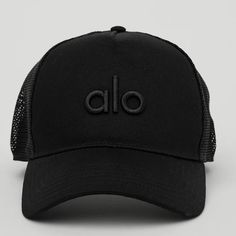 a black hat with the word alo embroidered on it's front and back